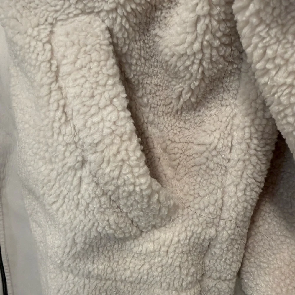 Lululemon Collarless Textured Fleece Full Zip jacket in the color White Opal